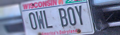 A close-up of my car's OwlBoy license plate.